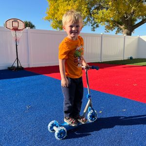 boy on scooter